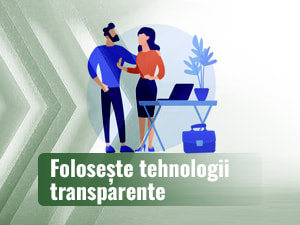 Două persoane care se sfătuiesc în fața unui laptop.